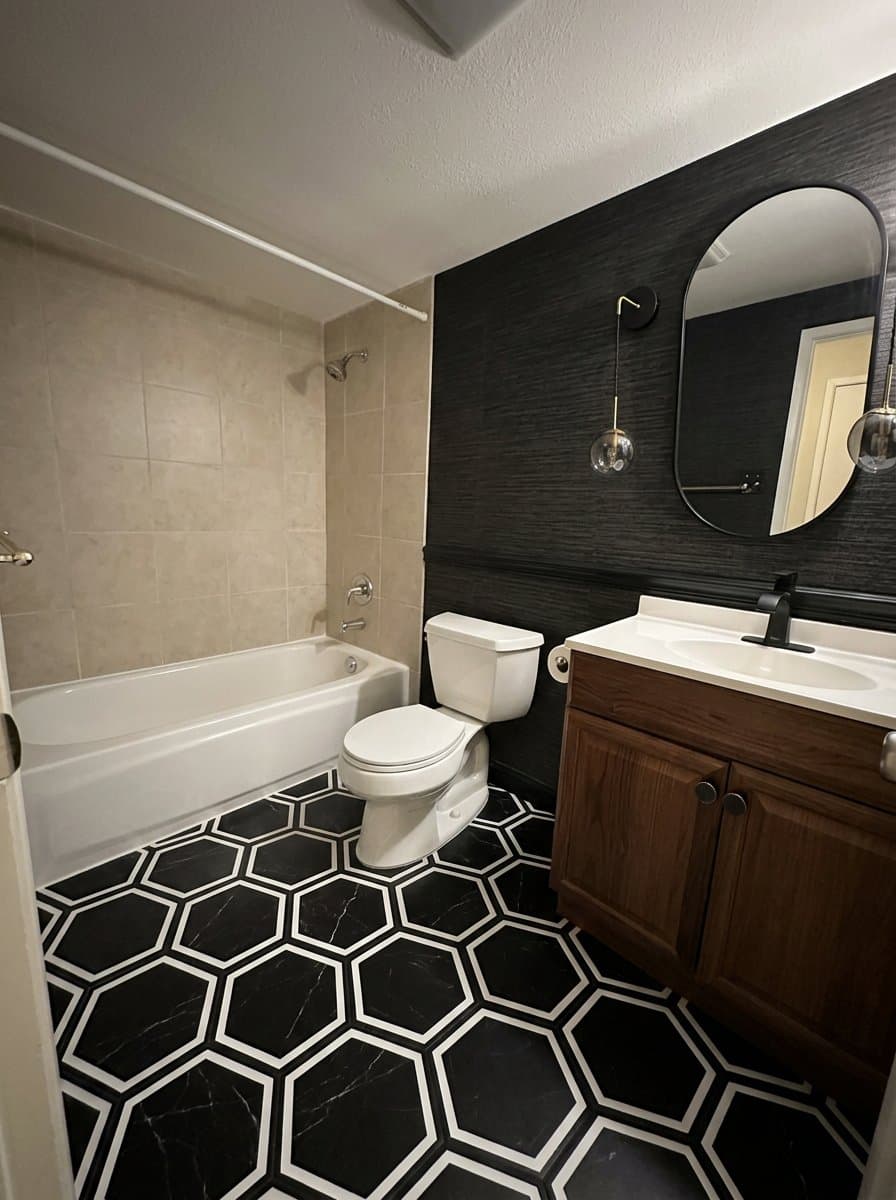 The same bathroom redesigned in the walnut noir style.